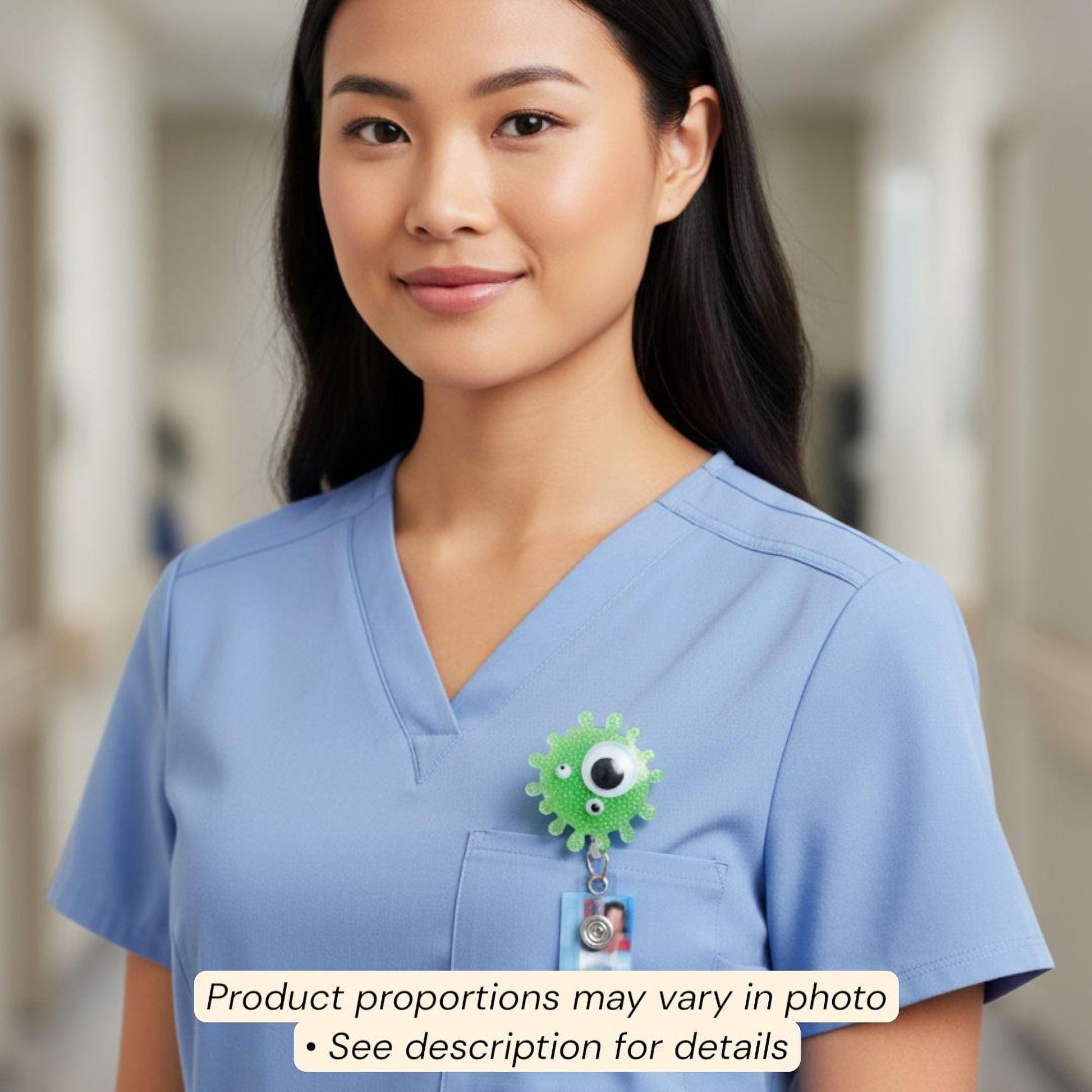A woman wearing a blue medical uniform with a green and white medical-themed badge on her left side.