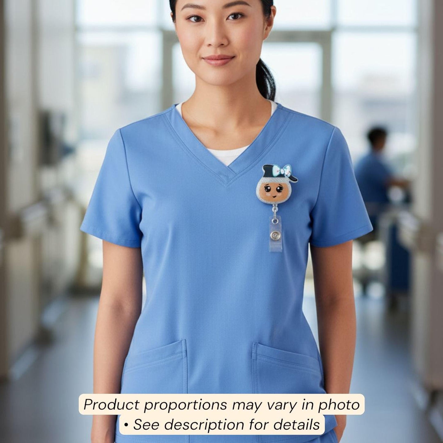 A woman wearing a blue medical uniform with a badge on the left side of her chest.