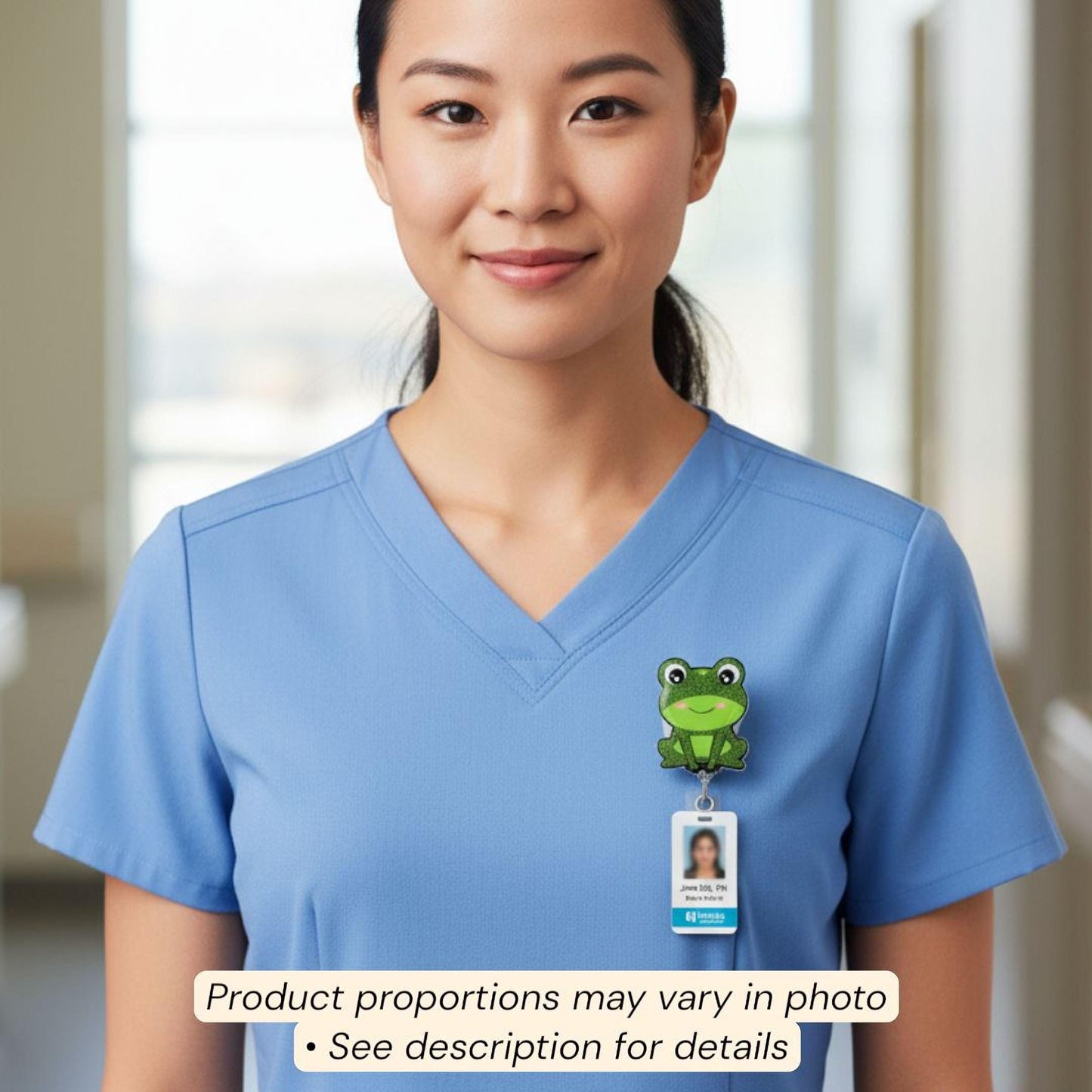 A woman wearing a blue medical uniform with a frog badge on her shirt.
