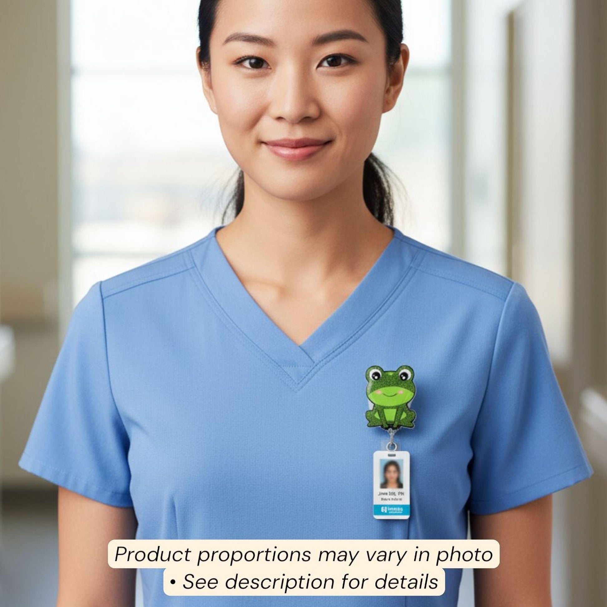 A woman wearing a blue medical uniform with a frog badge on her shirt.
