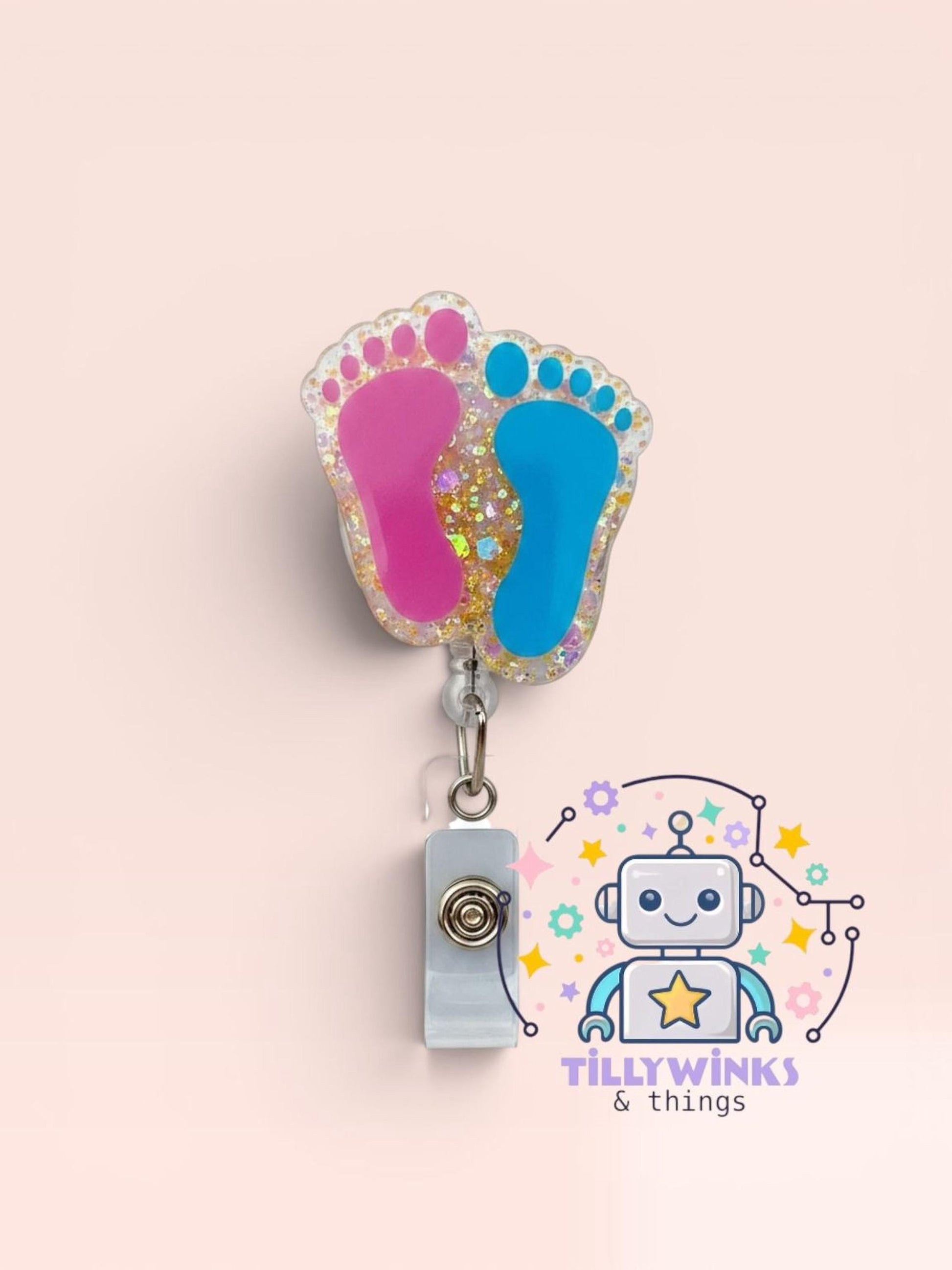 A pink glittery foot badge with a silver clip, and a robot-like character with a star and a smile, all set against a light pink background.