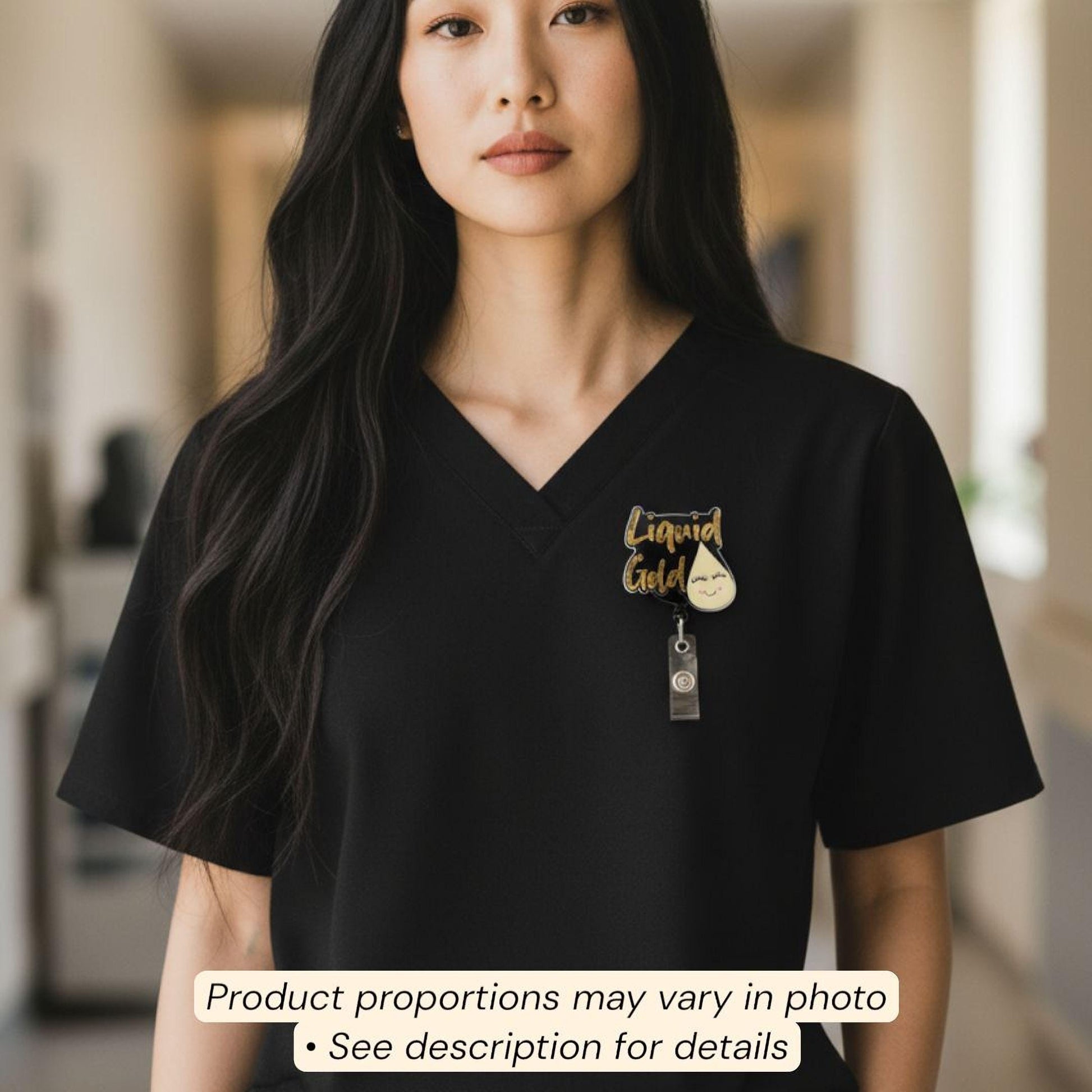 A woman wearing a black shirt with a badge that says "Liquor Gold" on it.