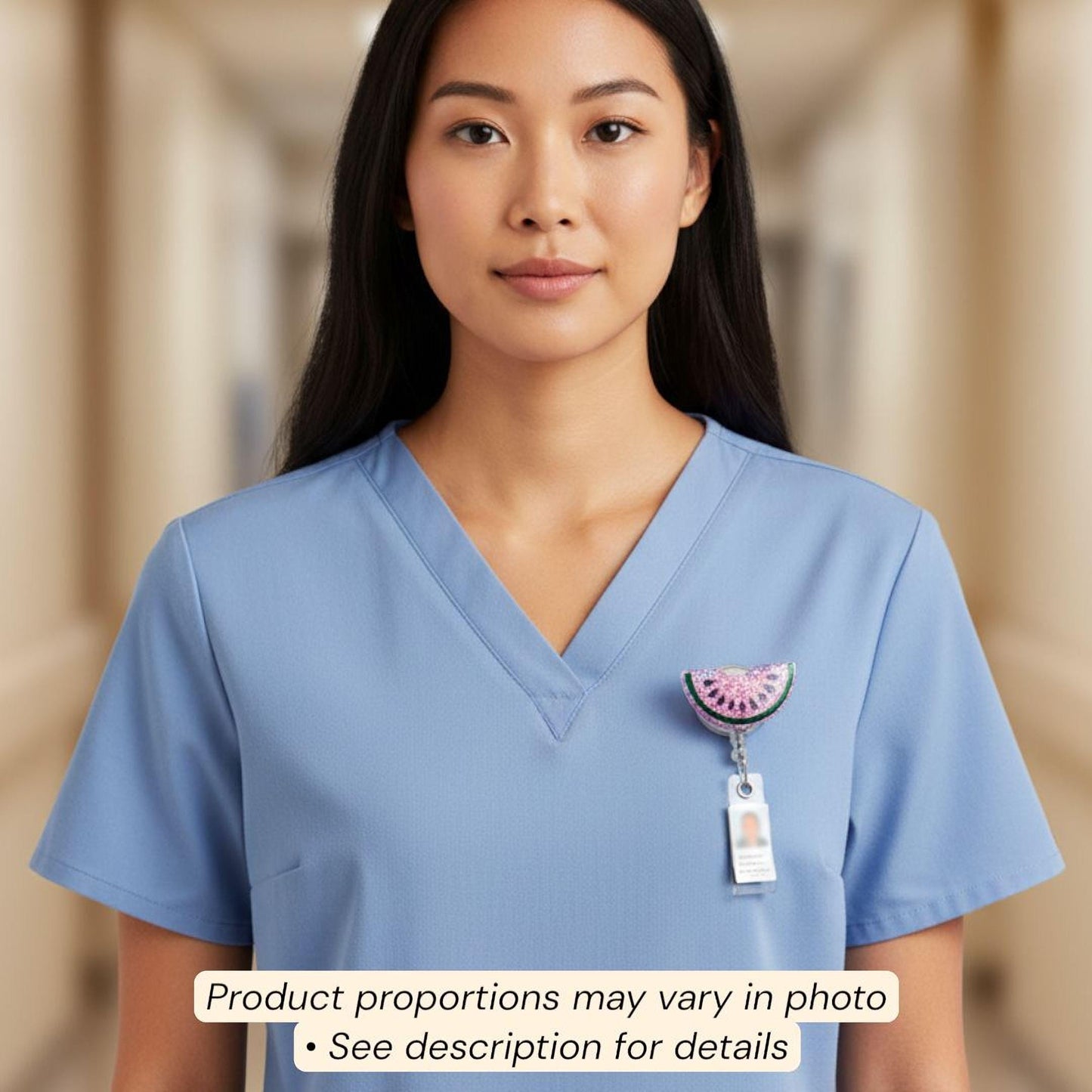 A woman wearing a blue medical uniform with a badge on the left side of her chest.